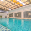 Отель Homey And Comfort Studio At Roosseno Plaza Apartment, фото 10