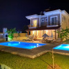 Отель Remarkable 4-bed Villa Tasgin 2 Pools, фото 12