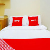 Отель Super OYO Flagship 90723 Berlima Guest House Syariah, фото 5