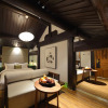 Отель Beijing Le Zai Nan Luo Gu Xiang Wang Fu Jing Forbidden City Courtyard Hotel, фото 12