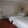 Отель Guest Inn & Suites, фото 4