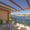 Отель Getawaysmalta - Harbour Lights Seafront Penthouse With Terrace St Paul's Bay, фото 18