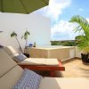 Отель 2Story Penthouse with Hot Tub Panoramic Jungle Views Charming Balcony in Bahia Principe, фото 12