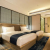Отель Echarm Hotel Jingjiang Zhongzhou Road, фото 3