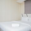 Отель Cozy And Comfort Living 1Br At M-Town Residence в Куруге