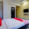 Отель OYO Flagship 805380 Gandharva Lodging, фото 7