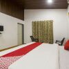 Отель OYO 15225 Rainbow House, фото 23