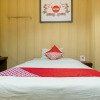 Отель OYO 741 Hotel Labuhan Raya, фото 13
