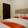 Отель Oyo 1158 Basecamp Hostel, фото 5
