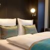 Отель Motel One Munich - Olympia Gate, фото 7