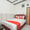 Отель OYO 1480 Villa Dua Putri, фото 7