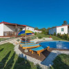 Отель Holiday House with Private Pool for 6-8 Persons in the Holiday Park Jelovci, фото 32