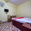Отель OYO 11935 White Cloud Guest House, фото 6