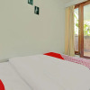 Отель OYO 90512 Tiny House, фото 14