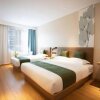 Отель GreenTree Inn Express Shanghai Pudong Lingang New City Yunhan Road, фото 7