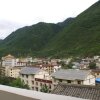 Отель Jiuzhaigou Yue Ding Inn, фото 4