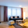 Отель TITLIS Resort Wohnung 305 в Энгельберге