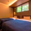 Отель Nasu Highland Park Official Hotel Towa Pure Cottages, фото 11