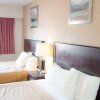 Отель Econo Lodge Inn & Suites Kamloops, фото 2