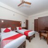 Отель OYO Flagship 095 Athithi Inn, фото 3