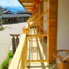 Отель Lijiang Lugu Lake Shouwang Inn, фото 2