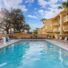 Отель La Quinta Inn by Wyndham Orlando Airport West, фото 10