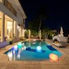 Отель Luxury Home Villa D' Amore Southern Florida Paradise Sleeps 10 5 Bedroom Villa by RedAwning, фото 9