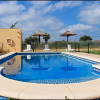 Отель Bungalow en complejo I, con piscina compartida, фото 12