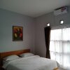 Отель Villa Fahim 2 Puncak 4 Bedroom, фото 15
