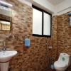 Отель Exhilarating Jhamel 2BHK Apartment, фото 7