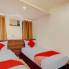 Отель Super Capital O 232 Premium Nest Nano Suites Fort, фото 6