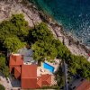 Отель Villa Sumartin Selca stunning luxurious frontline 7 bedrooms villa amazing sea-views на Острове Брач