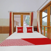 Отель OYO 92533 Harjuna Guest House, фото 12
