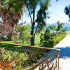 Отель Amarynthos Beachfront Vacation House with Garden, фото 24