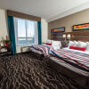 Отель Encore Suites by Service Plus Inns, фото 3