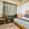 Отель Capital O 84060 Gold Rock Resort- Libra Cottage, фото 7