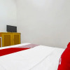 Отель OYO 3060 Al Fatih Guest House Syariah, фото 7