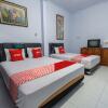 Отель OYO 93976 Maluku Guest House, фото 7
