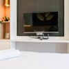 Отель Homey And Tidy Studio At Supermall Mansion Apartment, фото 14
