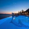 Отель Villa MIRNA with heated pool & whirlpool, traditional wine bar, 150m from sea, фото 44