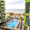 Отель Sea Gem 2BR apt Spa n Pool Beach resort, фото 1