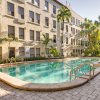 Отель Palm Beach Condo w/ Outdoor Pool: 1 Block to Beach в Палм-Биче