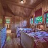 Отель Executive Plus 44 - Majestic log Chalet With hot tub Sauna Heated Pool and Close to Activities, фото 11