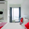 Отель OYO 3390 Apartment Grand Kamala Lagoon Avenue, фото 4