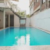 Отель OYO 15225 Rainbow House, фото 30
