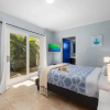 Отель Tranquil 2br2ba Close to the Beach Shared Pool, фото 10