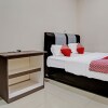 Отель OYO 92233 Srikandi Homestay Syariah, фото 6