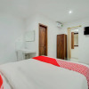 Отель OYO 3306 Ganandra, фото 4