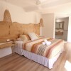 Отель Bellvilla Suites в Меримбуле