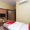 Отель OYO 14808 Rajkamal Palace, фото 14